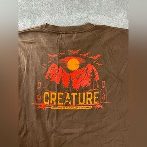 CREATURE T Shirt Mens XL Brown Skateboarding Welcome To Camp Black And Green
